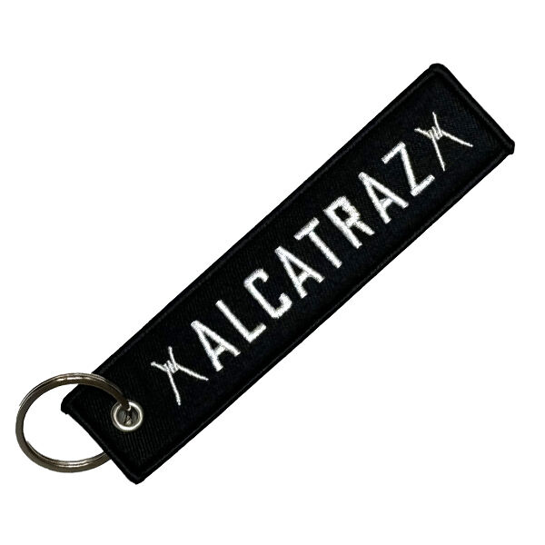 Geborduurde remove before flight sleutelhanger Geborduurde remove before flight sleutelhanger