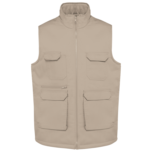 Gewatteerde uniseks bodywarmer van polykatoen multizakken Beige XS Gewatteerde uniseks bodywarmer van polykatoen multizakken Beige XS