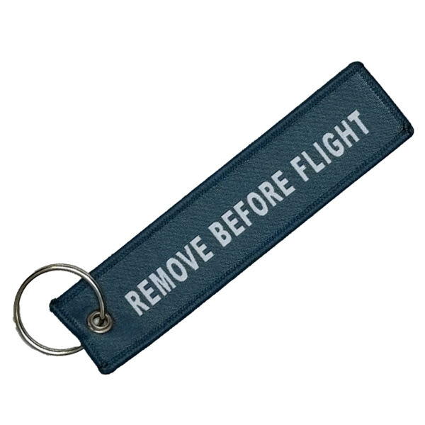 Geweven remove before flight sleutelhanger Geweven remove before flight sleutelhanger