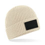 Trendy muts met patch Oatmeal / Black One Size